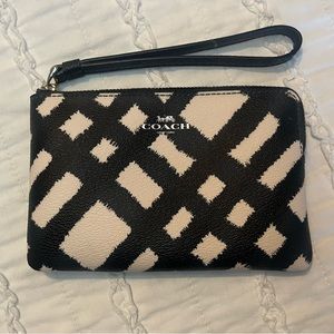 Black and white Coach wristlet
